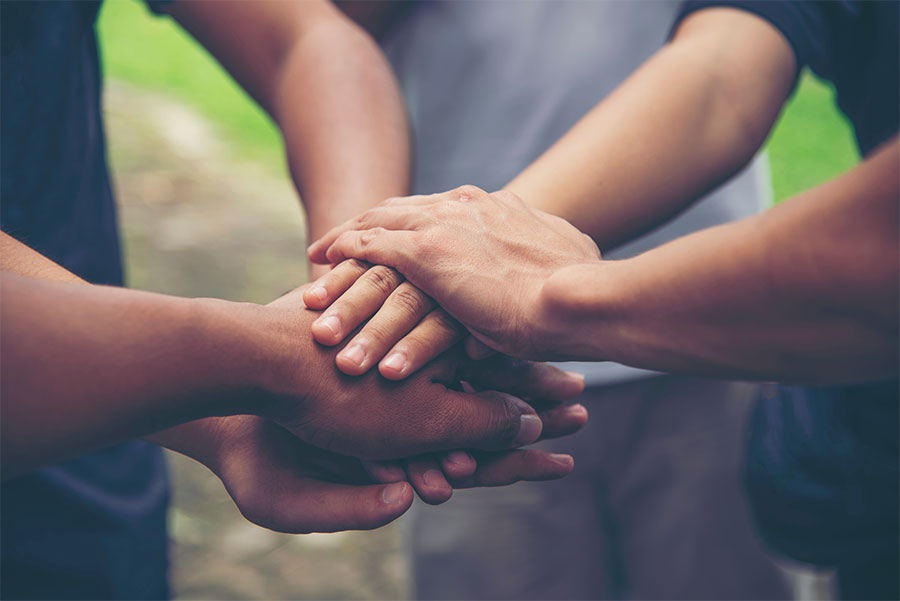 close up of group hands